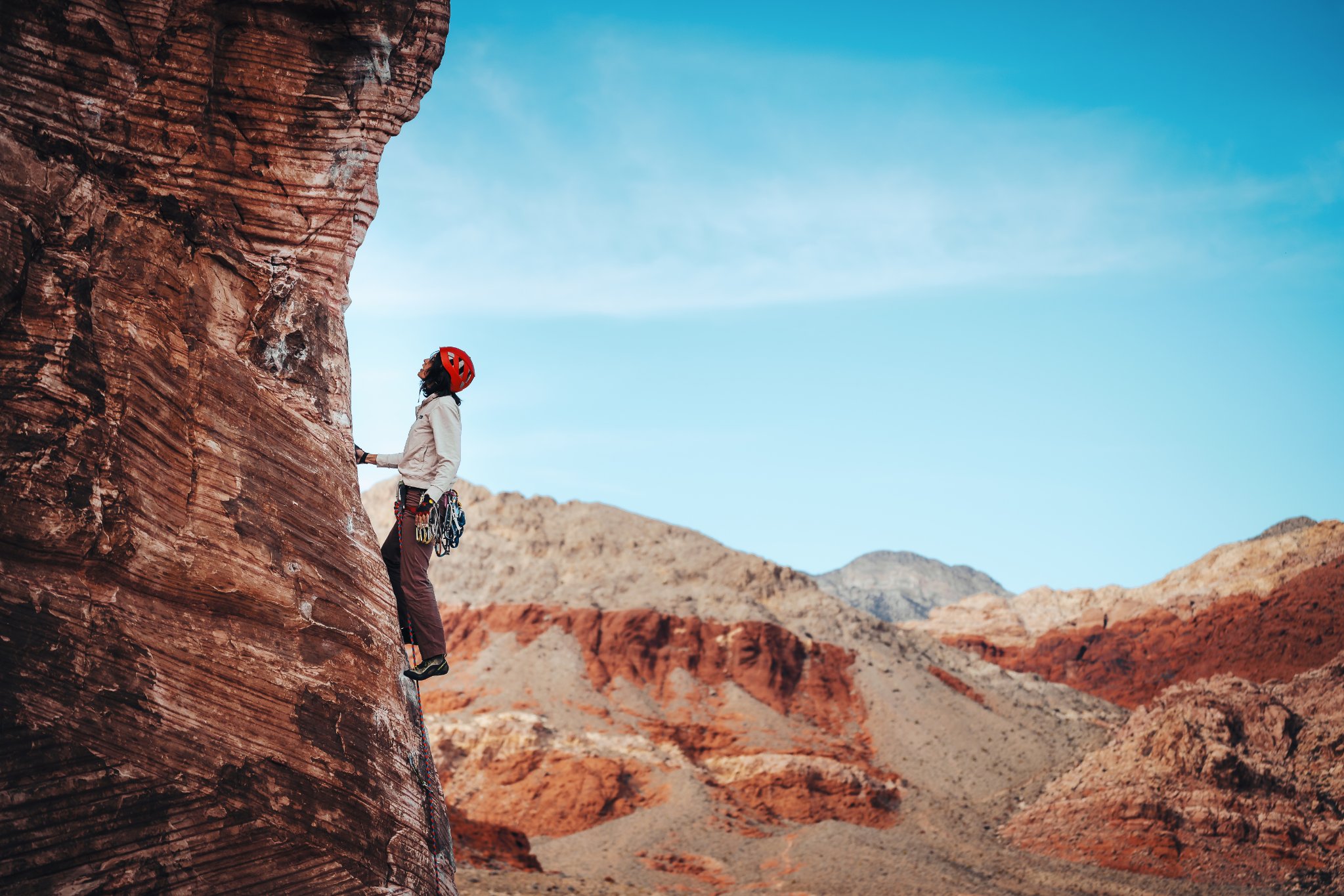 Kelly leading on red sandstone